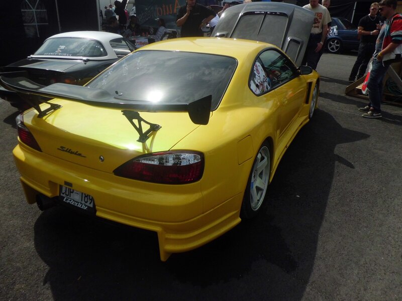 Yellow sports car at a show