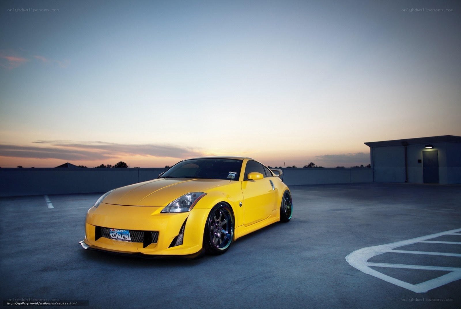 Yellow sports car at dusk