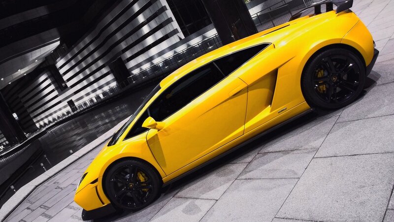 yellow sports car at night
