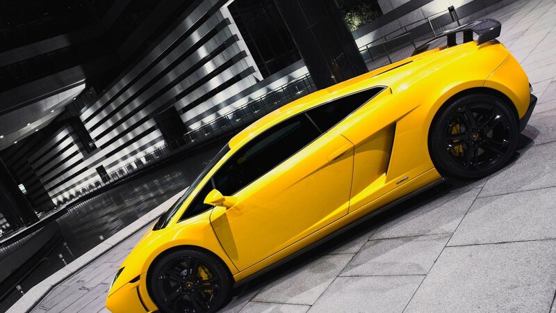 yellow sports car at night