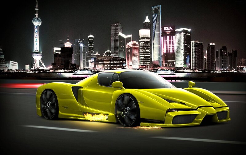 Yellow sports car at night