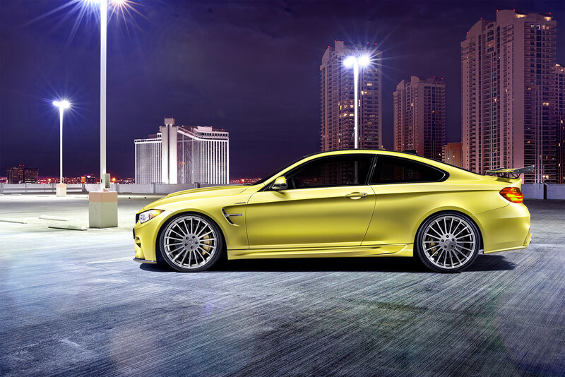 Yellow sports car at night
