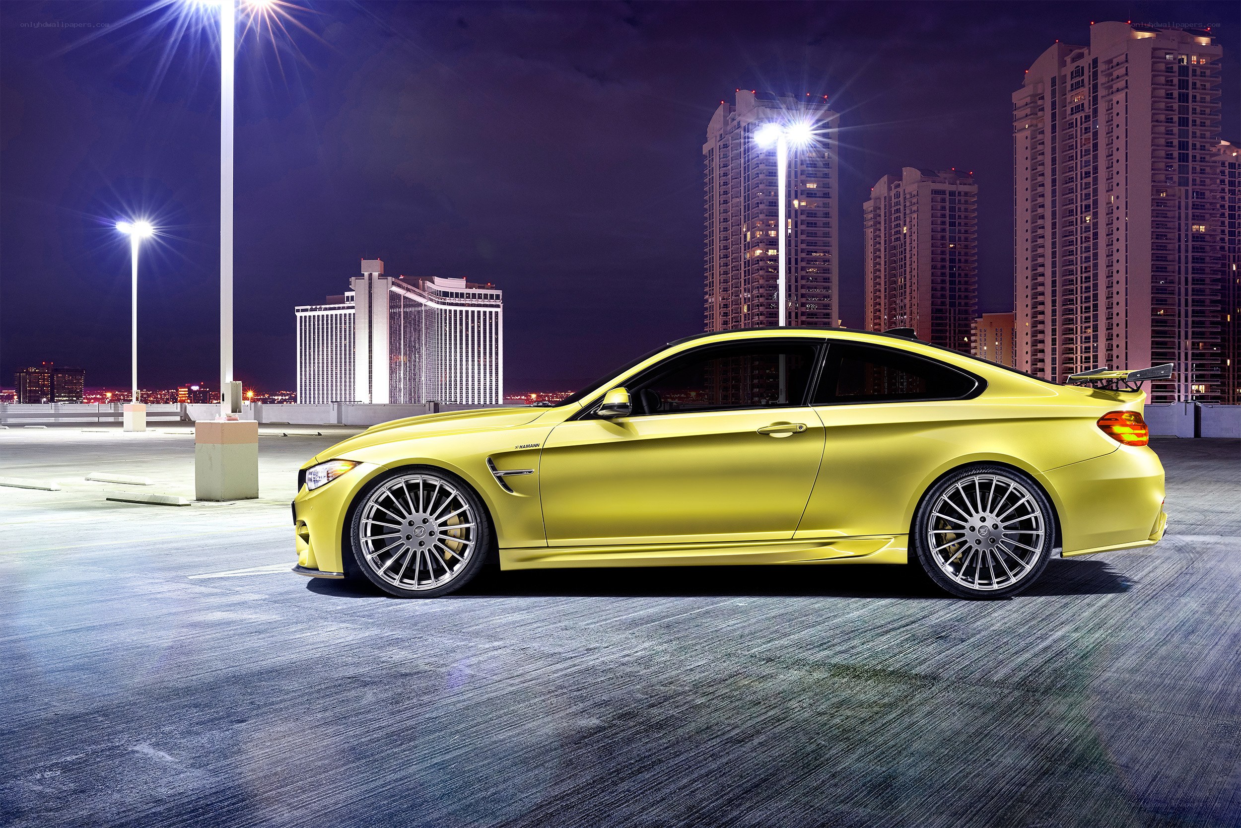 Yellow sports car at night