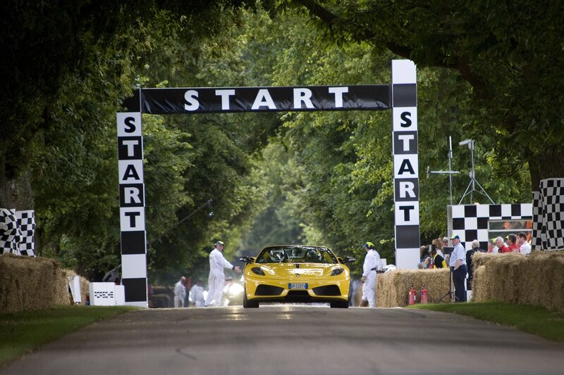 Yellow sports car at start line