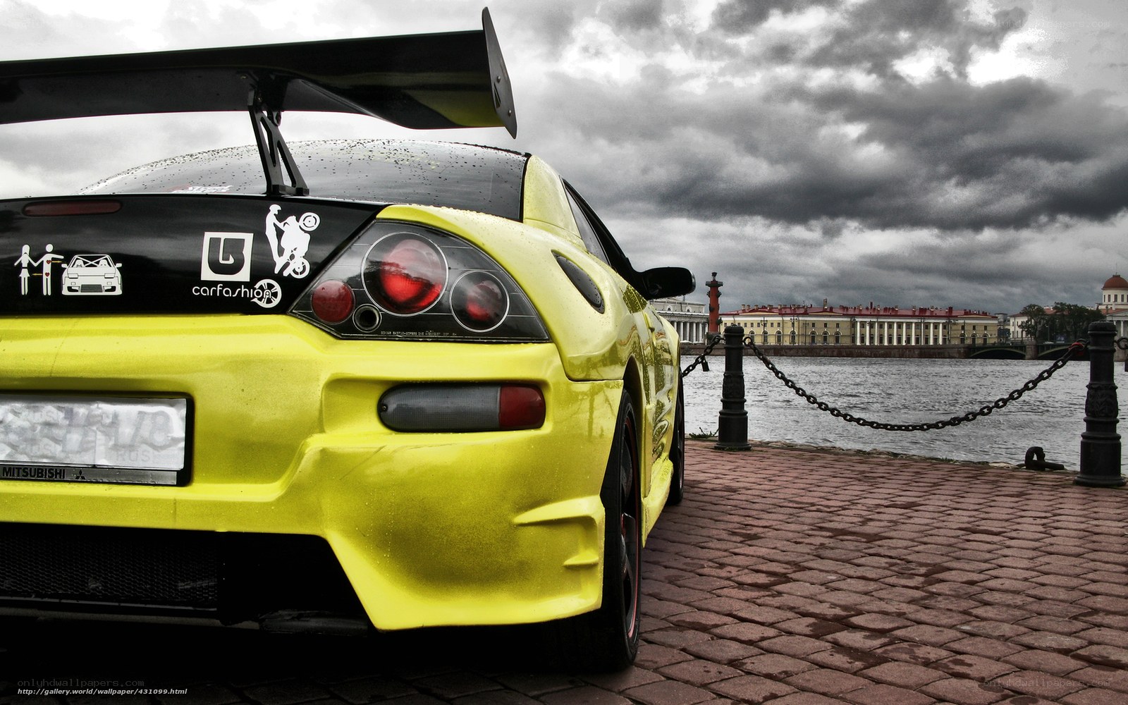 Yellow sports car by the river