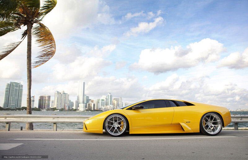 Yellow sports car by the waterfront