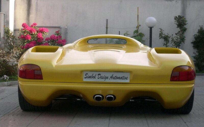 Yellow Sports Car — Calm, Afternoon, Photograph, Flowers