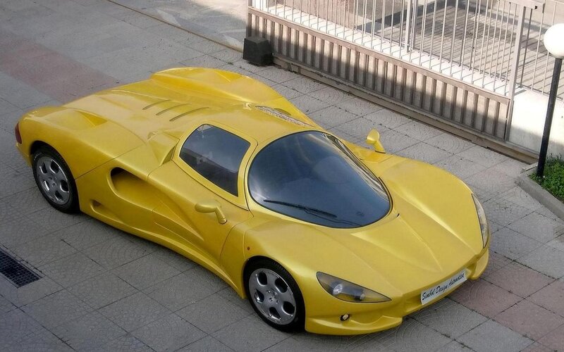 Yellow Sports Car — Calm, Afternoon, Photograph, Gate