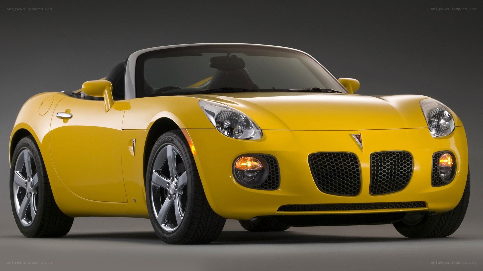 yellow sports car convertible