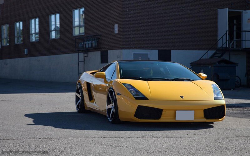 Yellow Sports Car — Dramatic, Afternoon, Photograph, Brick Building