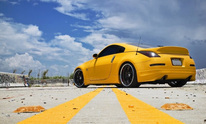 Yellow Sports Car — Dramatic, Afternoon, Photograph, Concrete Surface, Graffiti Wall