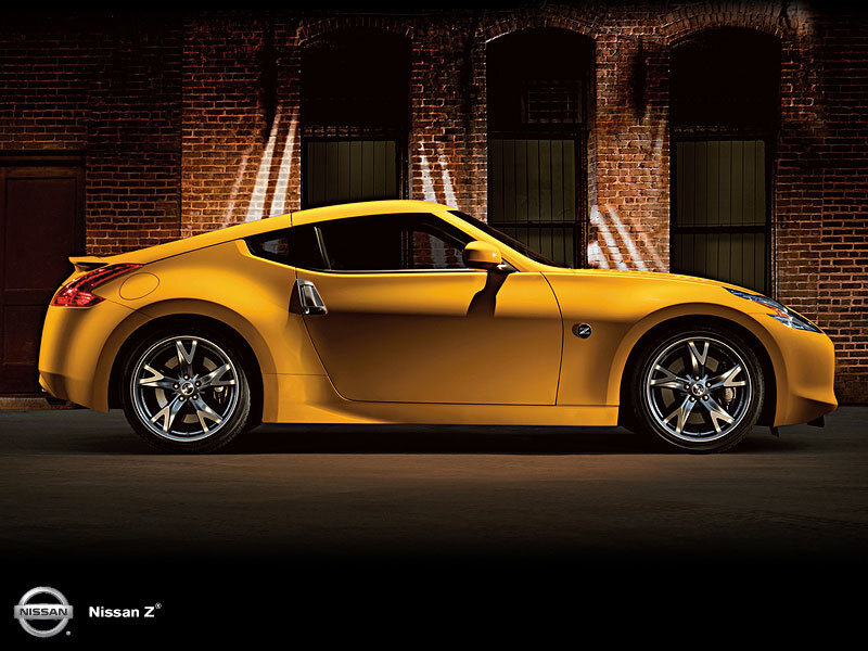 Yellow Sports Car — Dramatic, Night, Photograph, Brick Wall, Windows