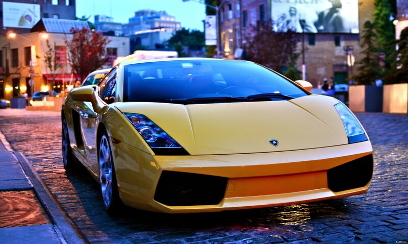 Yellow Sports Car — Dramatic, Night, Photograph, Cobblestone Street