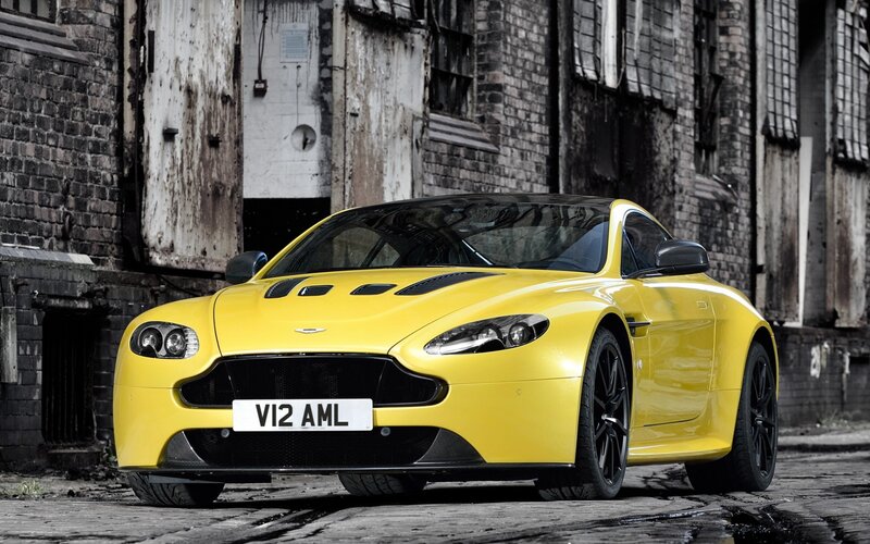 Yellow Sports Car — Dramatic, Photograph, Brick Building, License Plate