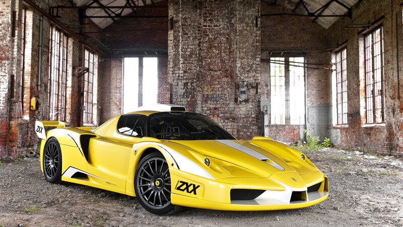 Yellow Sports Car — Dramatic, Photograph, Brick Building, Windows