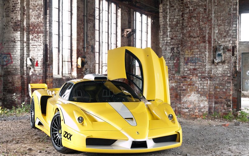 Yellow Sports Car — Dramatic, Photograph, Brick Wall, Open Door