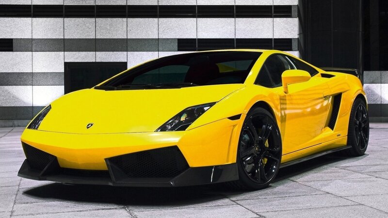 Yellow Sports Car — Dramatic, Photograph, Building, Pavement