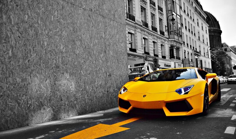 Yellow Sports Car — Dramatic, Photograph, Building, Street, Black