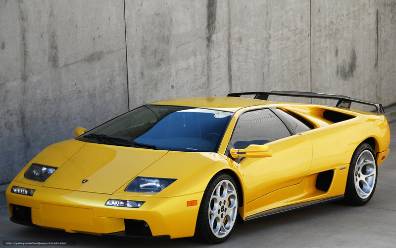 Yellow Sports Car — Dramatic, Photograph, Concrete Wall