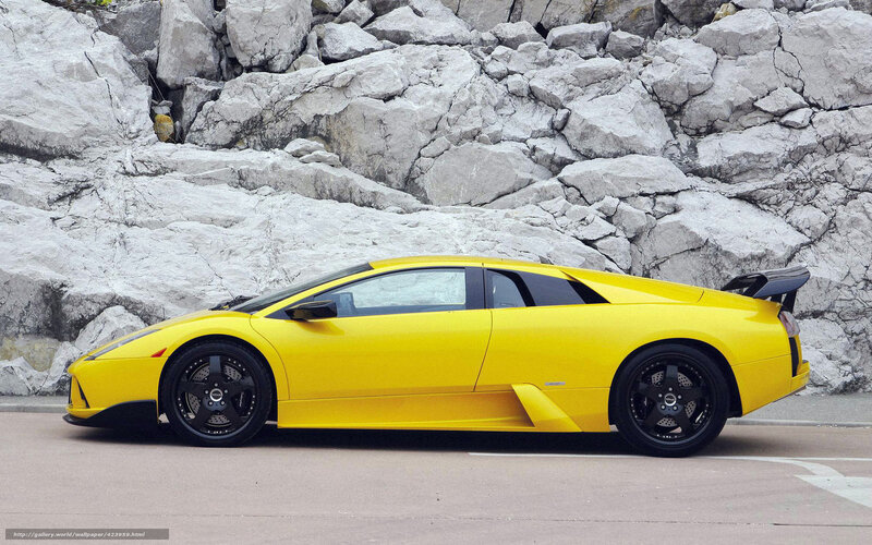 Yellow Sports Car — Dramatic, Photograph, Rock Wall