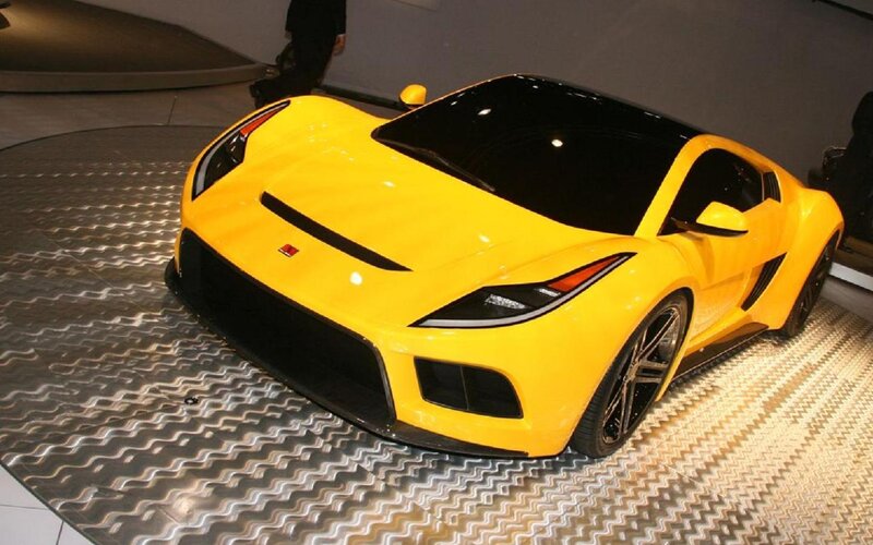 Yellow Sports Car — Dramatic, Photograph, Show Floor
