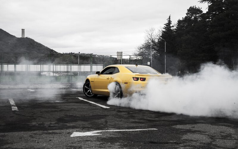 Yellow Sports Car — Dramatic, Photograph, Smoke