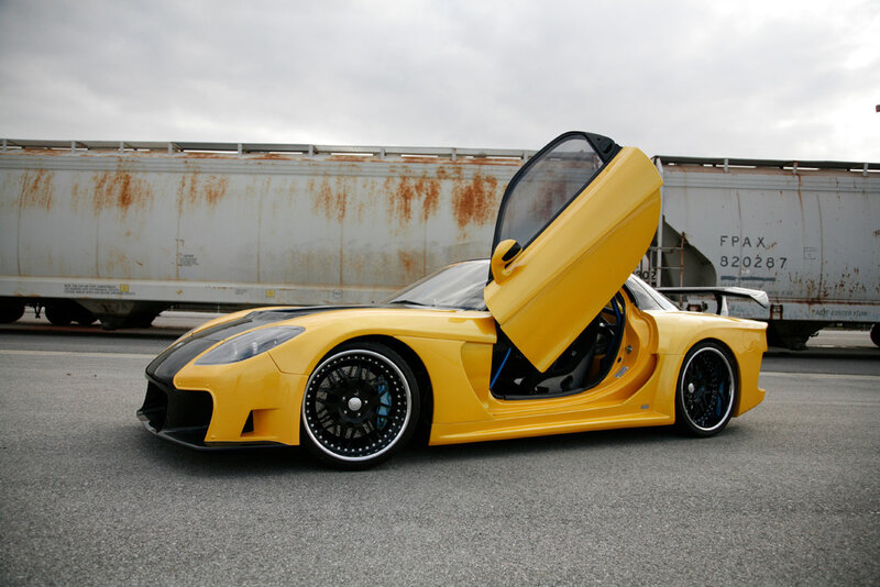Yellow Sports Car — Dramatic, Photograph, Train Cars