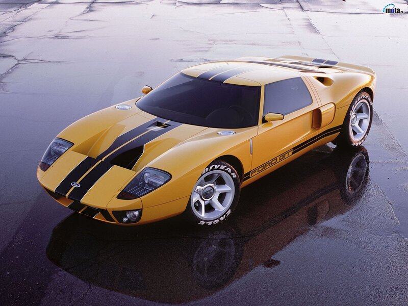 Yellow Sports Car — Dramatic, Photograph, Wet Pavement, Tires