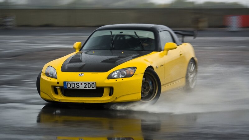 Yellow sports car drifting