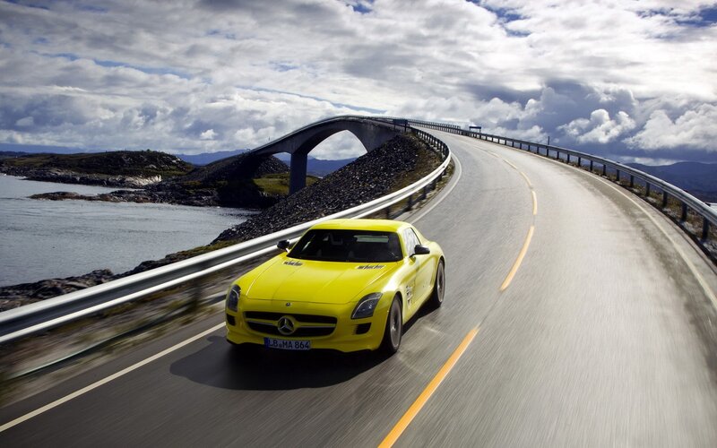 Yellow Sports Car — Dynamic, Afternoon, Photograph, Bridge, Road, Sea