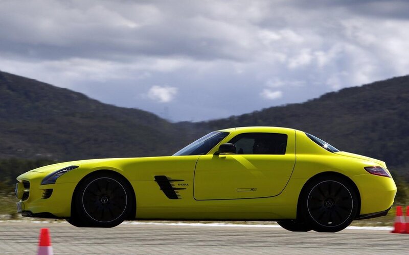 Yellow Sports Car — Dynamic, Afternoon, Photograph, Mountains