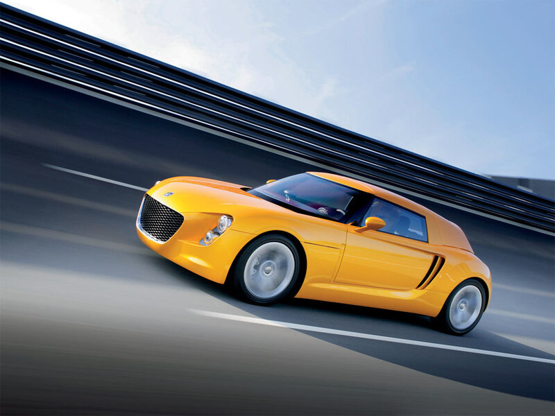 Yellow Sports Car — Dynamic, Afternoon, Photograph, Road, Guardrail, Sky, Black, Gray