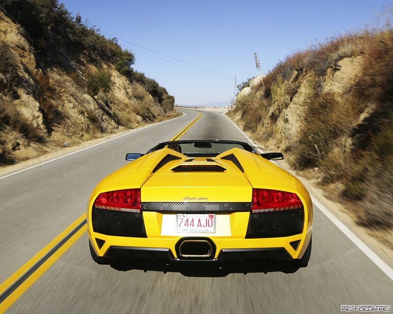Yellow Sports Car — Dynamic, Afternoon, Photograph, Road, Hills, License Plate