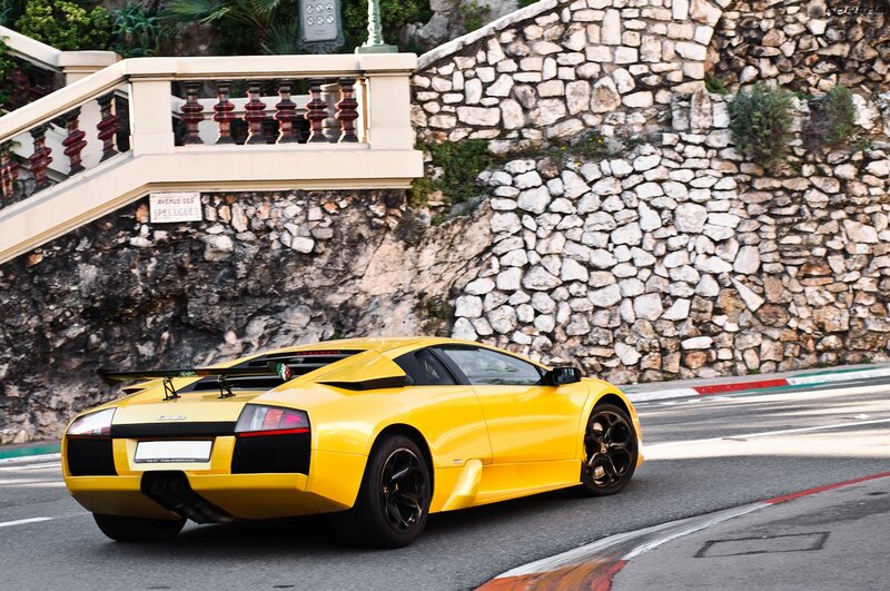 Yellow Sports Car — Dynamic, Afternoon, Photograph, Stone Wall