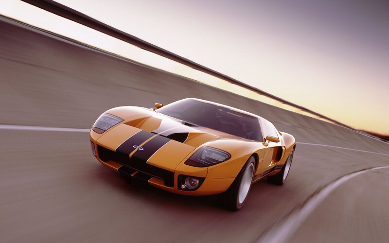 Yellow Sports Car — Dynamic, Sunset, Photograph, Race Track, Black