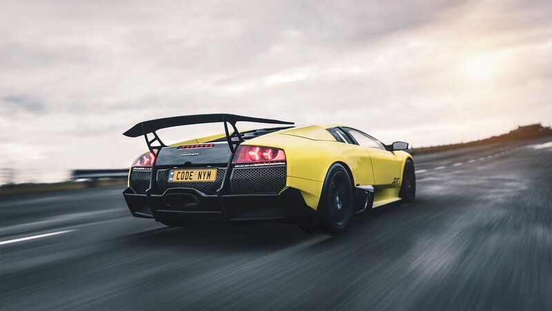 Yellow Sports Car — Dynamic, Sunset, Photograph, Road, Sky, Tail Light
