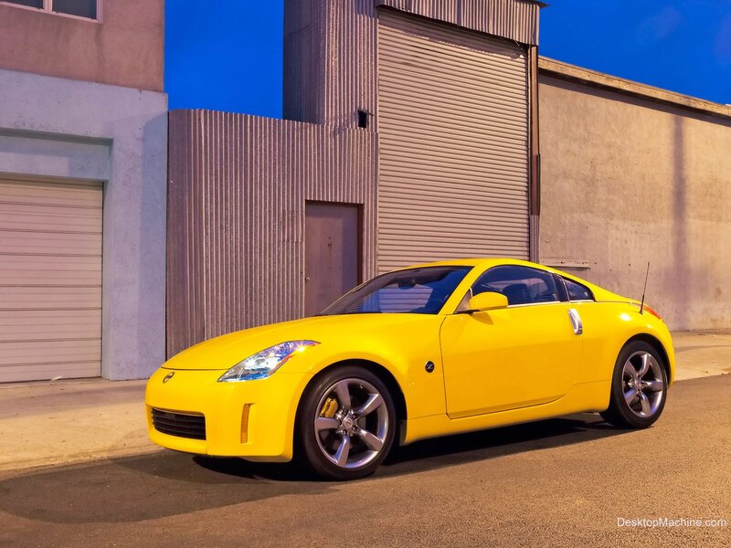 yellow sports car in alley