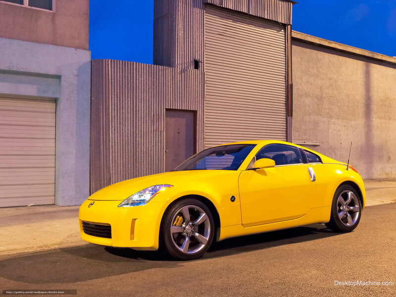 Yellow sports car in alley