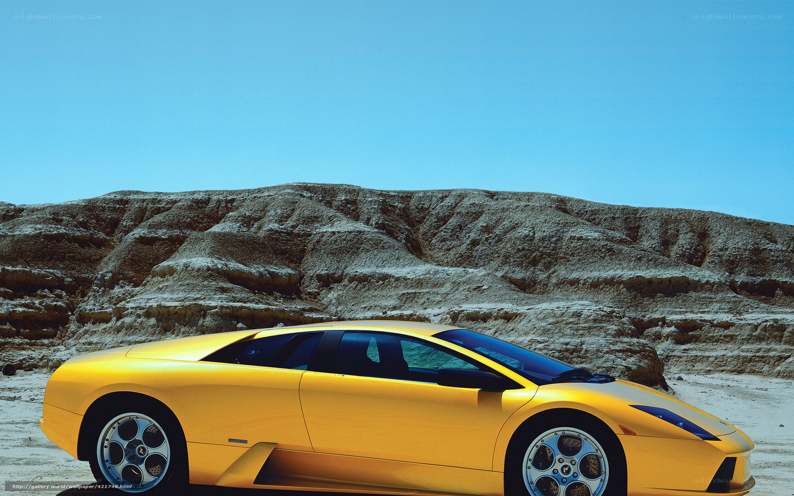 Yellow sports car in desert