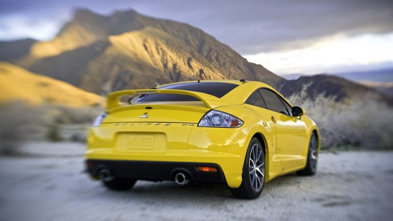 Yellow sports car in desert