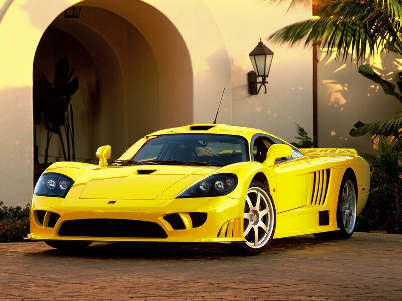 Yellow sports car in driveway