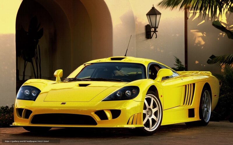 Yellow sports car in driveway
