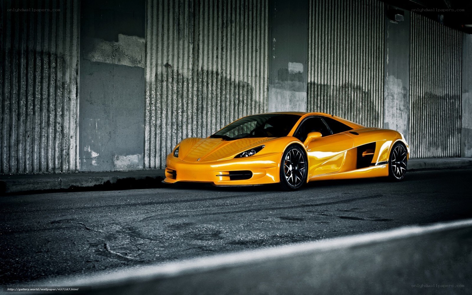 Yellow sports car in garage