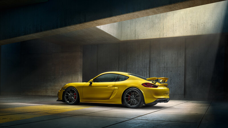 Yellow sports car in garage