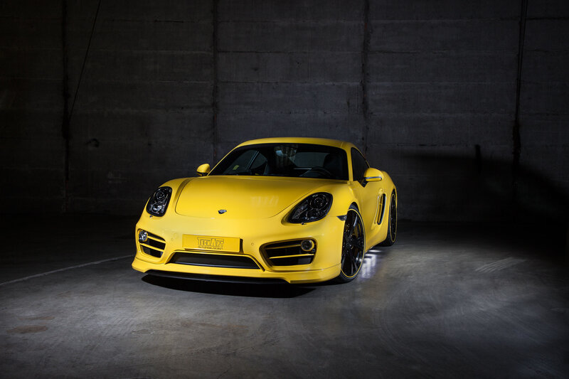Yellow sports car in garage