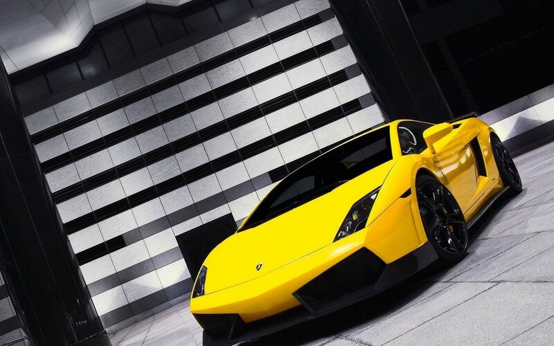yellow sports car in garage