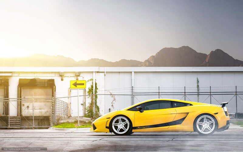 Yellow sports car in industrial area