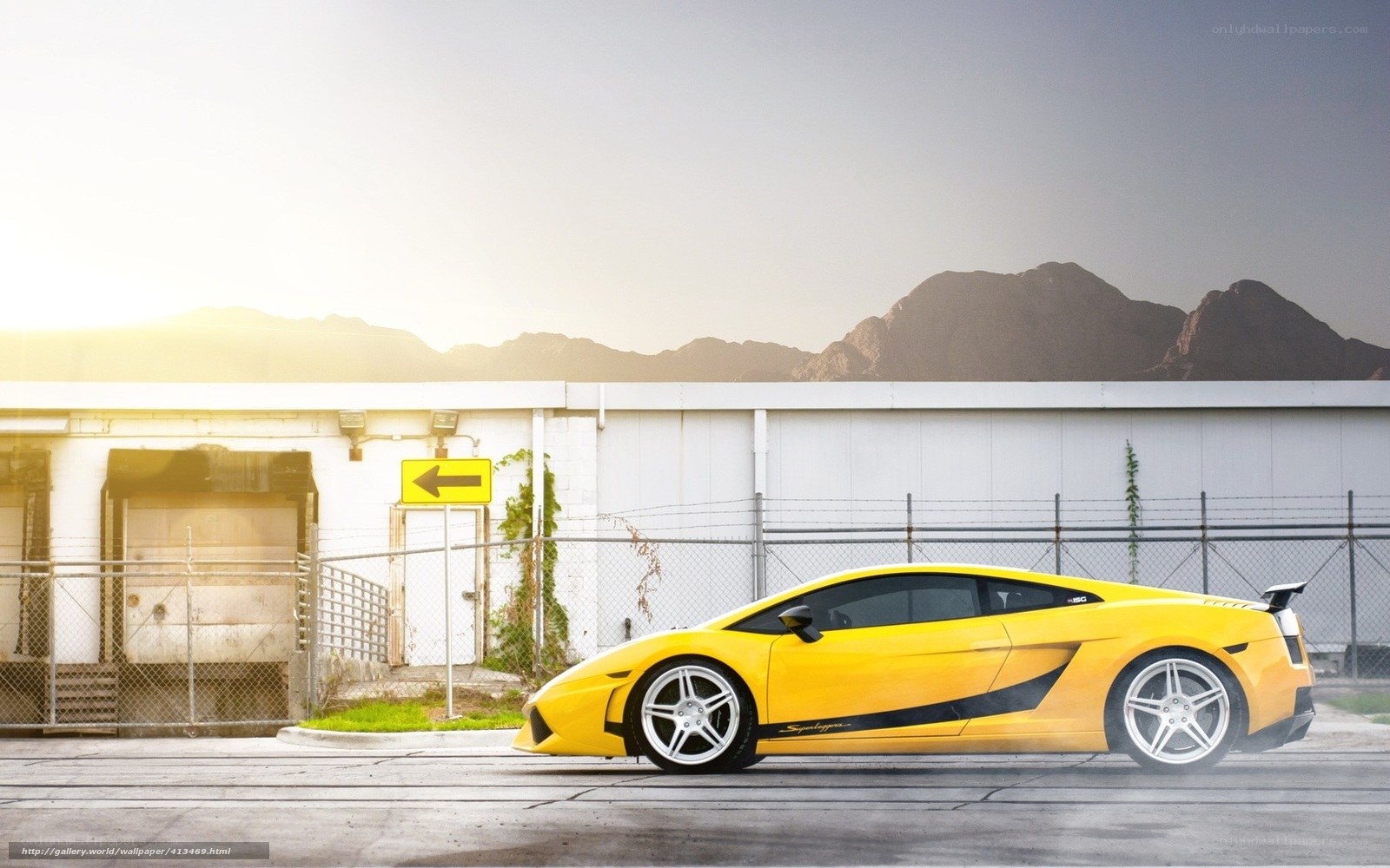 Yellow sports car in industrial area