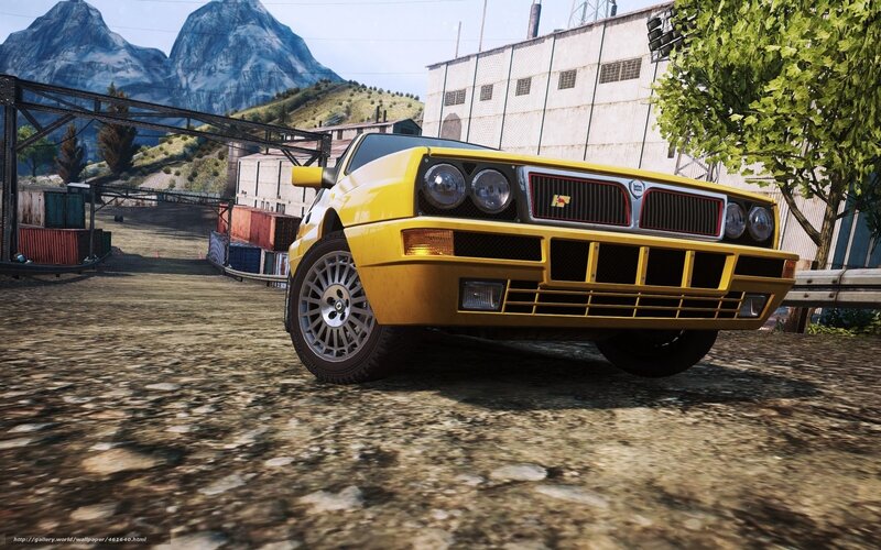 yellow sports car in industrial area