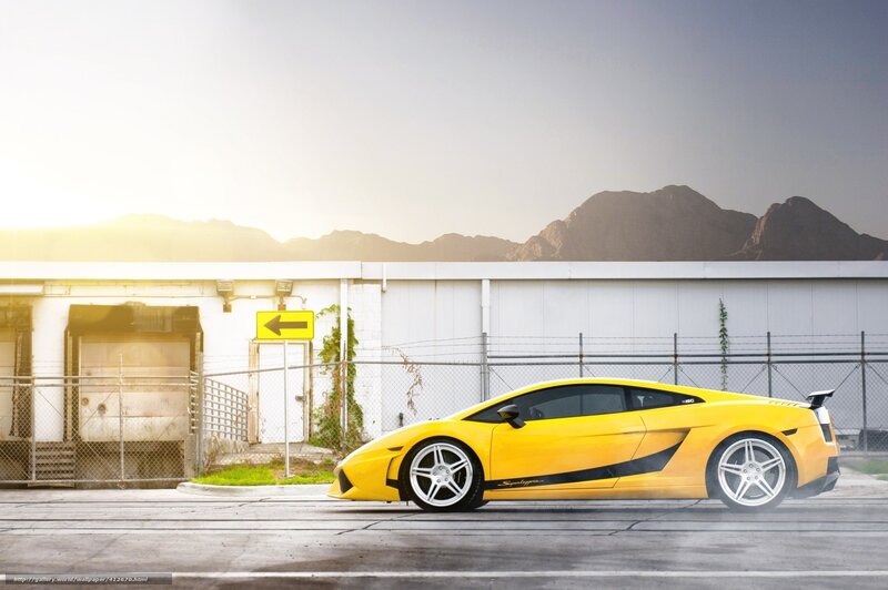 Yellow sports car in industrial area
